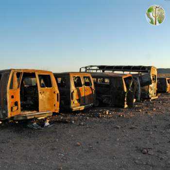 Burned out migrant vans, Sonora